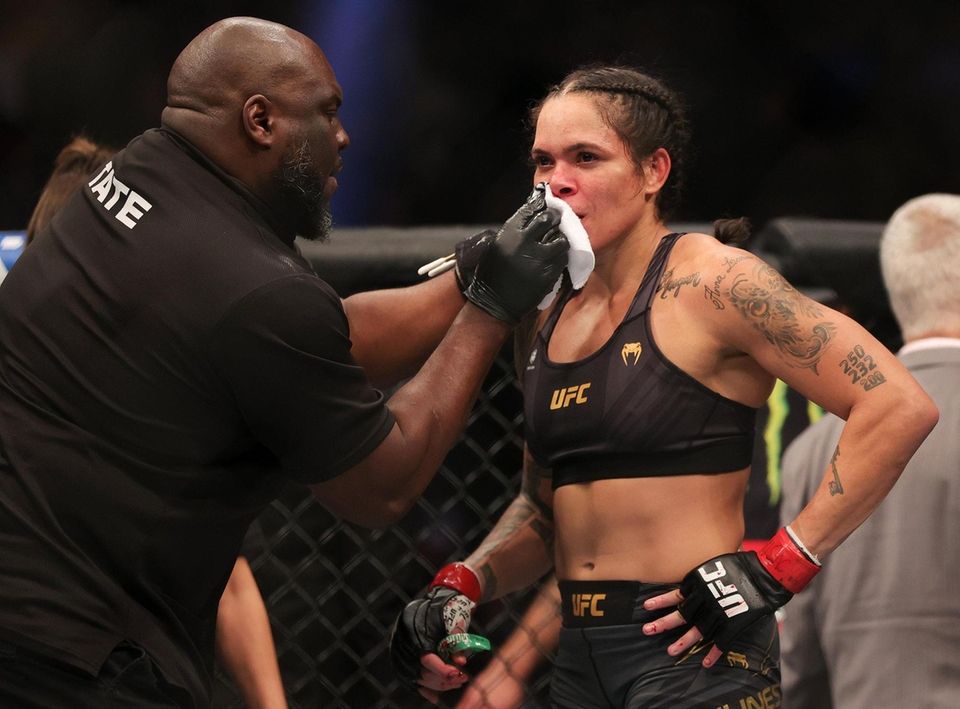 Amanda Nunes of Brazil is attended to following