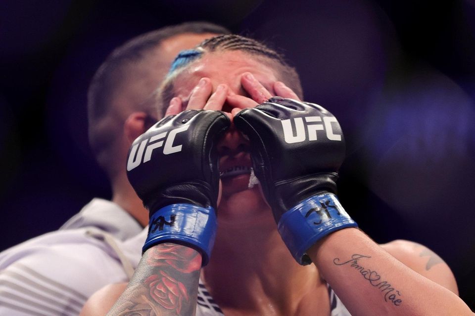 Priscila Cachoeira of Brazil reacts after her defeat