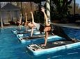 Deanna Arecco teaches a paddleboard yoga class in