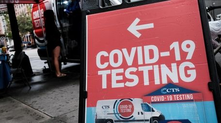 A pop-up COVID-19 testing site stands on