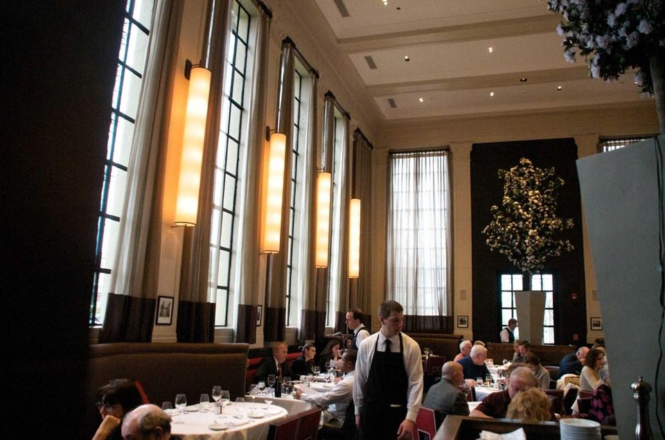 The dining room at Tellers in Islip soars