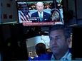 President Jose Biden appears on a screen as