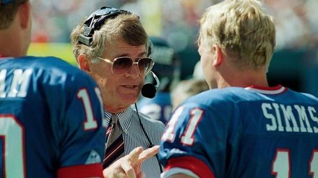 Giants head coach Dan Reeves gives some instructions