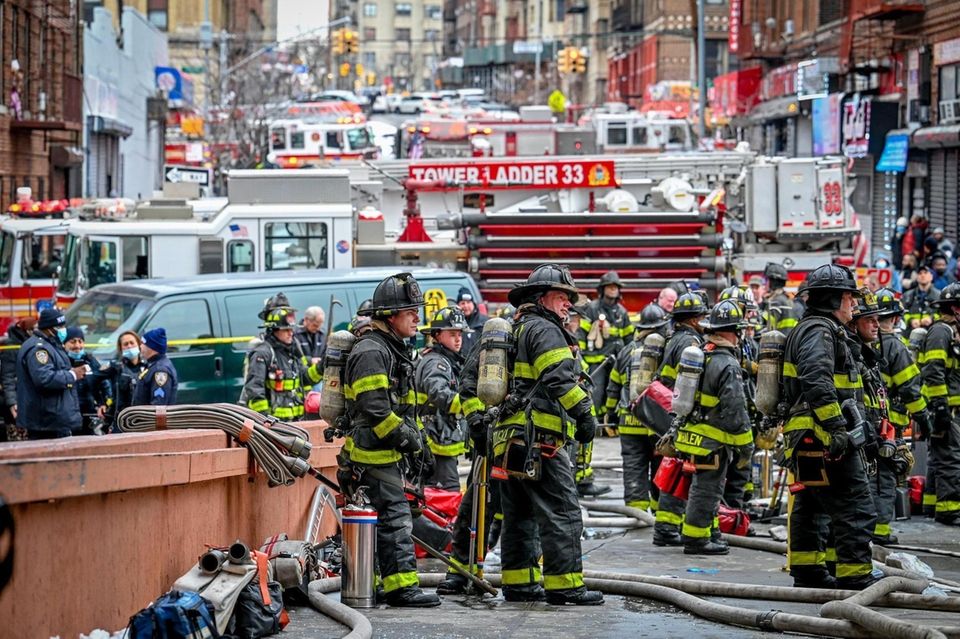 Firefighters and paramedics at the scene Sunday in