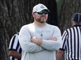 Joe Douglas, general manager of the Jets, watches
