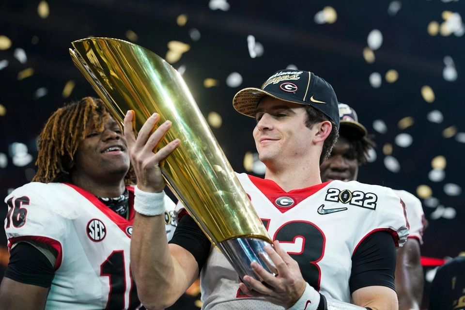 Georgia's Stetson Bennett celebrates after the College Football
