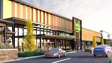 An architectural rendering shows the Whole Foods Market