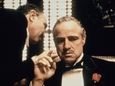 Marlon Brando, right, as Don Corleone, in a