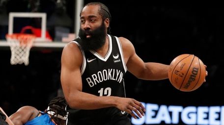 James Harden of the Brooklyn Nets drives past