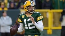 Aaron Rodgers of the Packers looks to pass