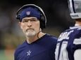 Cowboys acting head coach Dan Quinn walks the