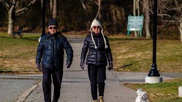 Benson and Jill Wu of Roslyn Estates walk