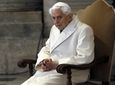 Pope Emeritus Benedict XVI sits in St. Peter's