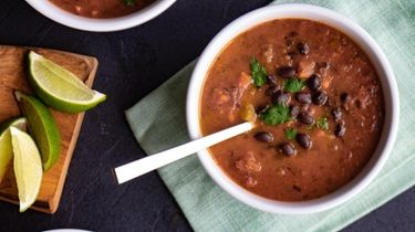 Nourishing, hearty black bean soup is on the