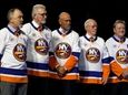 Former Islanders, from left, Bryan Trottier, Clark Gillies,