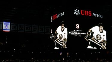 The retired #9 jersey banner of former Islanders