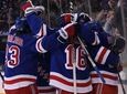 The Rangers celebrate a hat-trick goal by left
