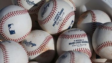 In this Feb. 14, 2020, file photo, baseballs