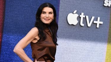 Julianna Margulies arrives at a photo call for