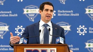 Giants general manager Joe Schoen answers questions at