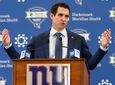 Giants general manager Joe Schoen answers questions at