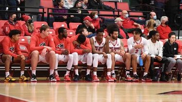 Players on the Stony Brook Seawolves bench look