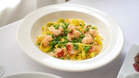 Hand-cut tagliatelle with lobster, peas and white butter