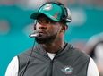 Dolphins head coach Brian Flores stands on the