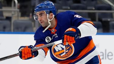 Kyle Palmieri of the Islanders warms up before