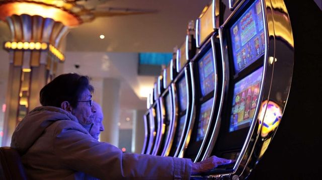 Patrons try their luck on gaming machines at