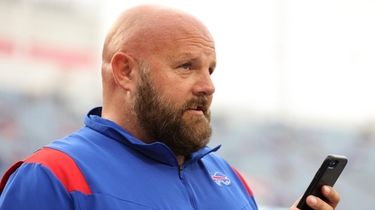 Bills offensive coordinator Brian Daboll looks on prior