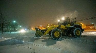A snowplow goes to work at the LIRR