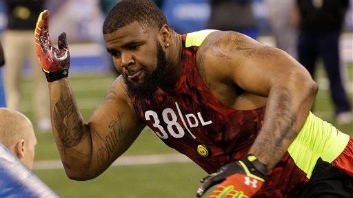 Missouri defensive lineman Sheldon Richardson runs a drill