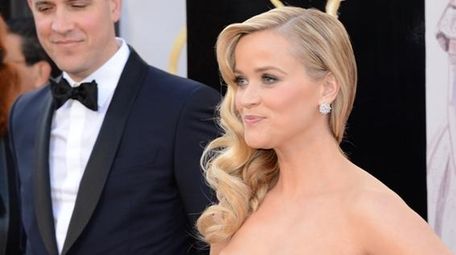 Reese Witherspoon and husband Jim Toth. (Getty Images)