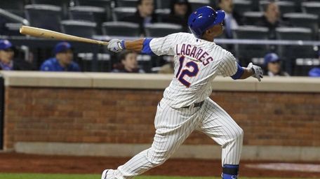 Juan Lagares flys out to left in his