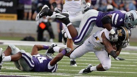 Missouri running back Henry Josey is tackled by