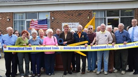 Hempstead Town Supervisor Kate Murray helps reopen the
