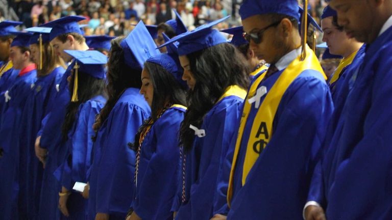 Hofstra University graduates and those in the audience