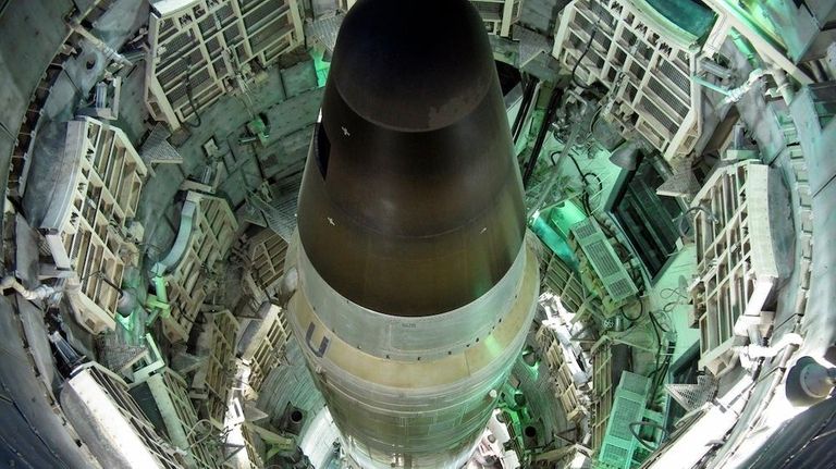 A Titan II missile in the launch duct