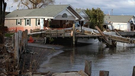 Homes along Beach Road in Stony Point suffered