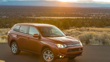 The 2014 Mitsubishi Outlander starts out as an