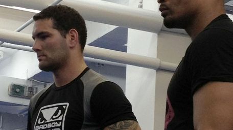 UFC fighters Chris Weidman, left, and David Branch