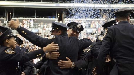 New York City Police Academy cadets celebrate at