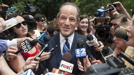 Former New York Governor Eliot Spitzer speaks to