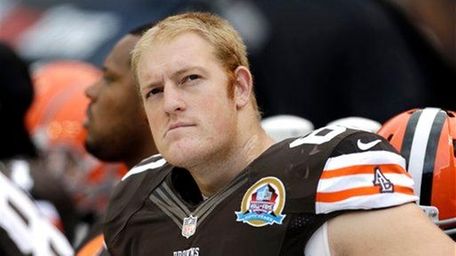 Cleveland Browns tackle Ryan Miller watches from the