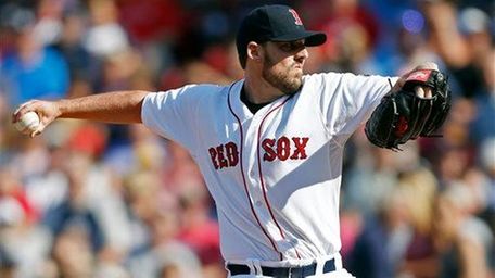 Boston Red Sox John Lackey pitches in the