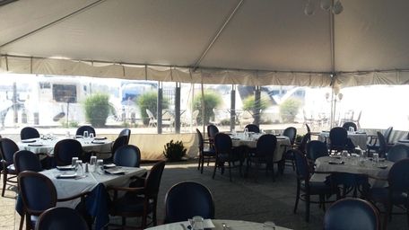In Merrick, AcQua's outdoor dining tent offers water