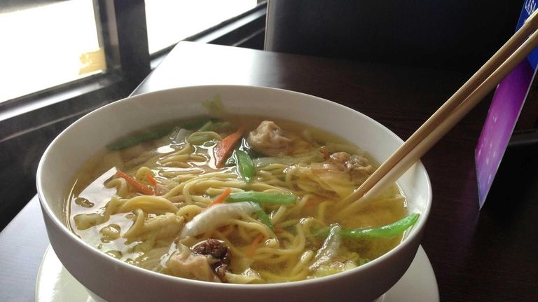 A big bowl of wonton noodle soup at