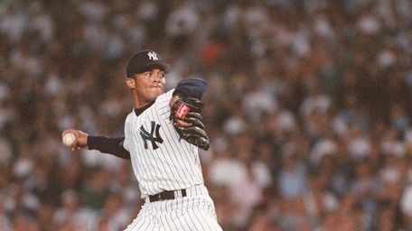Mariano Rivera earned his first postseason victory in