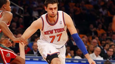 Andrea Bargnani of the Knicks controls the ball
